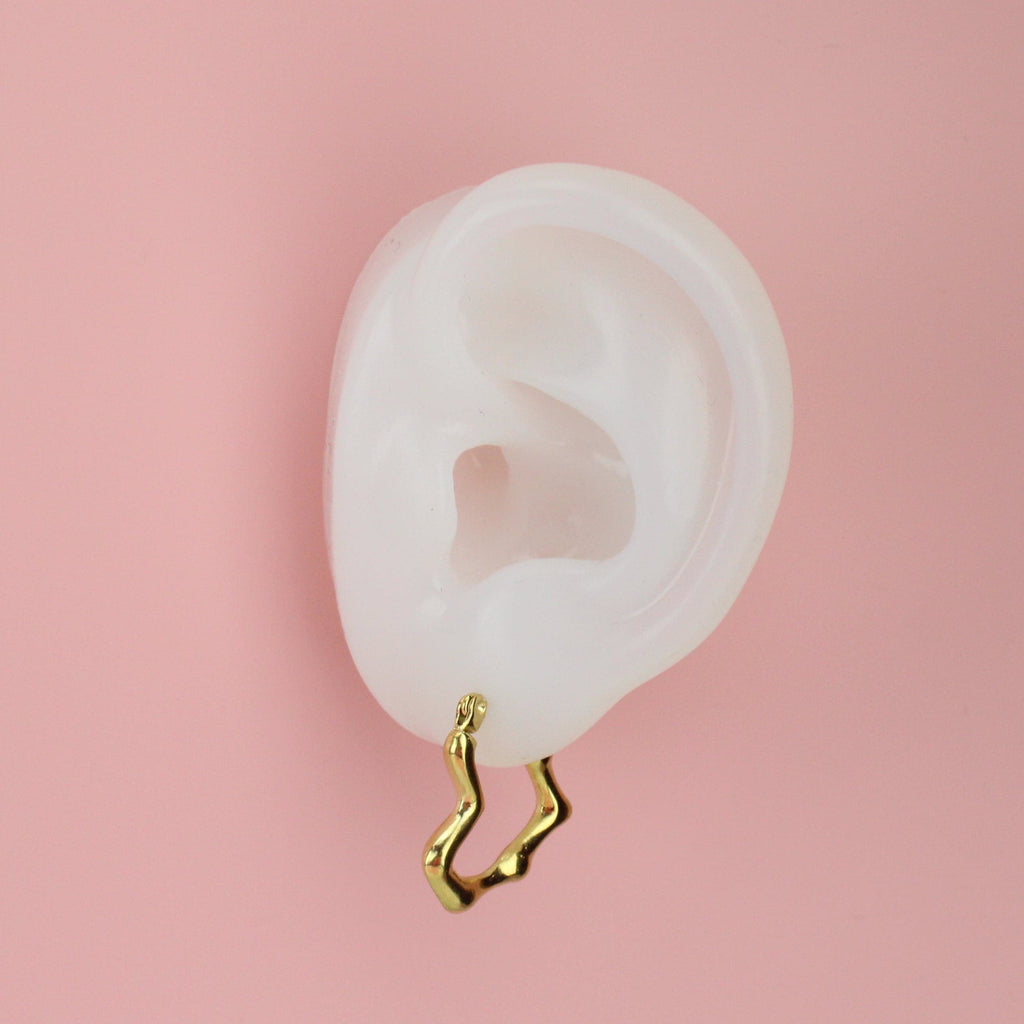 Ea showing the You Make My Heart Melt Hoop Earrings (Gold Plated)