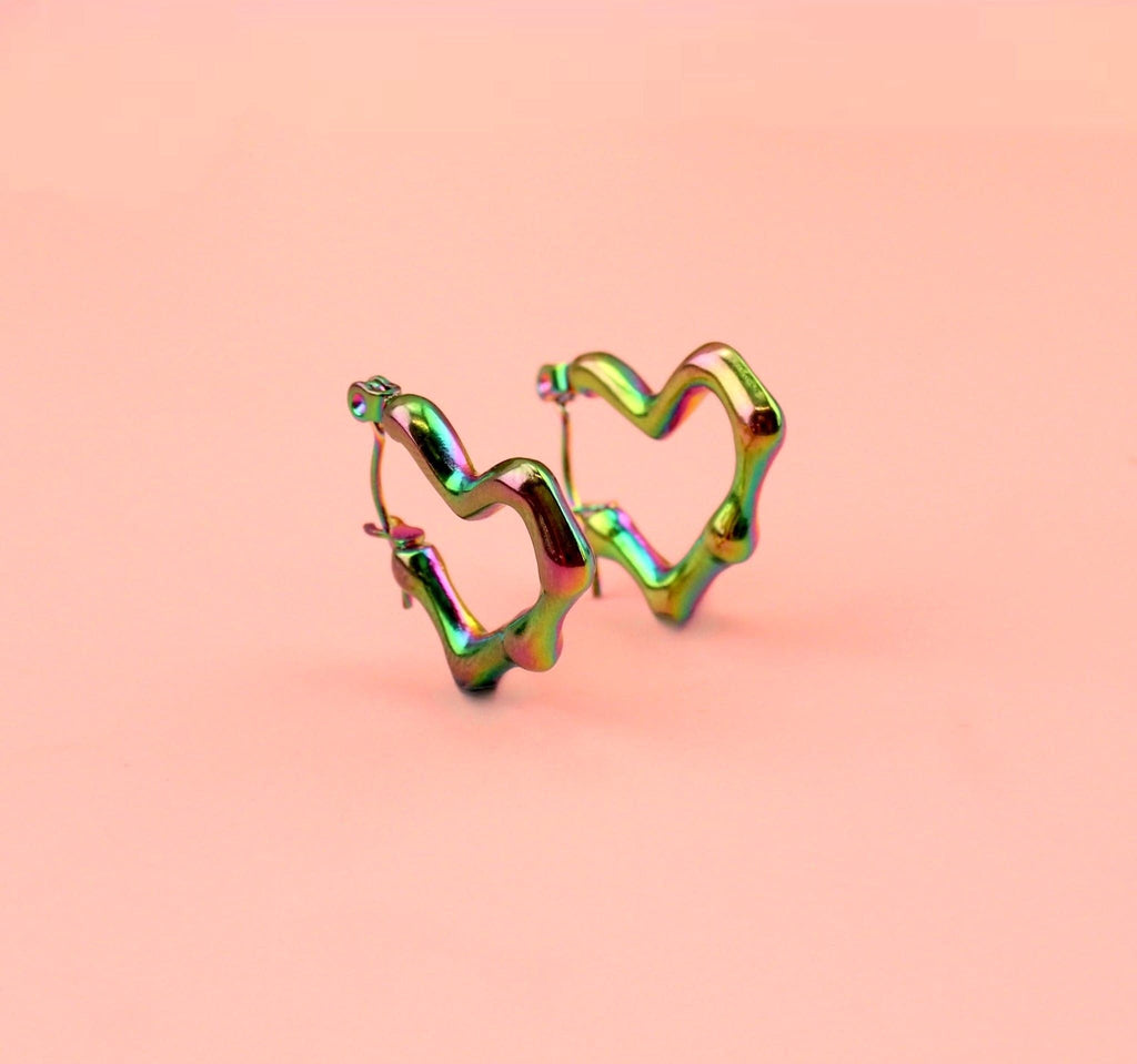 Heart shaped hoop earrings with an oil spill and a melted effect